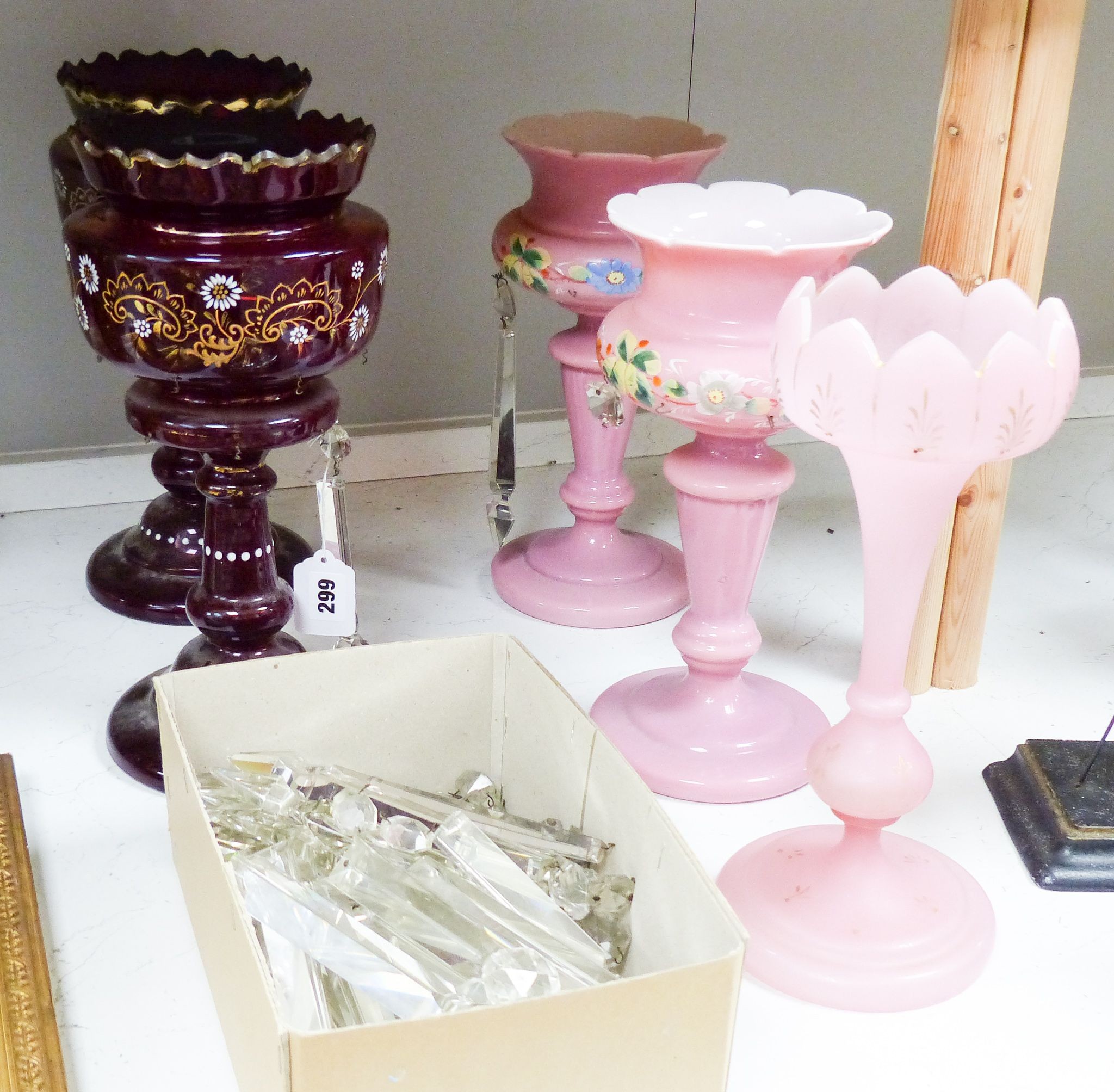 Two pairs of enamelled glass table lustres and another similar, late 19th century, tallest 36 cm